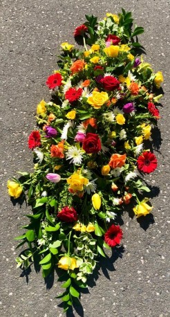 Vibrant Masculine Double Ended Coffin Spray